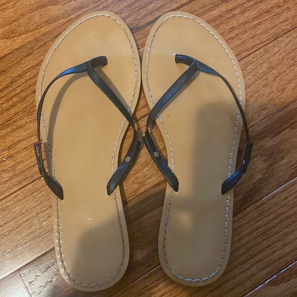 Black flip flop sandals
